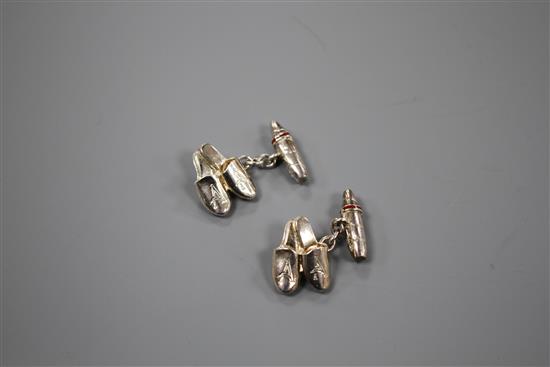 A pair of modern Asprey & Co silver and red enamel cufflinks, modelled as a pair of slippers, engraved with the letter A